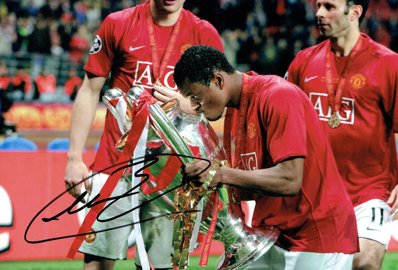 Patrice Evra - Manchester United - Treble - 12 x 8 Autographed Picture